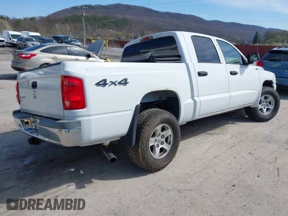 2006 Dodge Dakota SLT with VIN 1D7HW48K06S676241, listed as a IAAI auction lot 41986300 with 112,215 mi miles and . Bid and sale history available at DreamBid. Image 4.