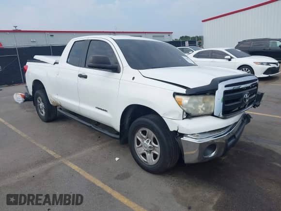 2012 Toyota Tundra z VIN 5TFRU5F17CX027958, wystawiony jako IAAI lot #42690061 z przebiegiem 228 438 mil mil oraz . Historia ofert i sprzedaży dostępna na DreamBid. Obrazek 1.