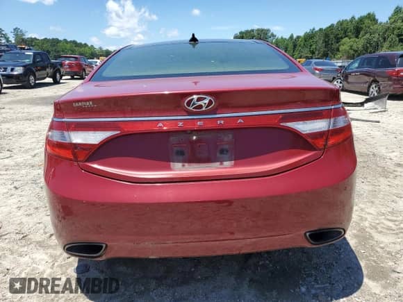 2013 Hyundai Azera z VIN KMHFH4JG2DA299556, wystawiony jako Copart lot #61410975 z przebiegiem Nie podano mil oraz Szkoda całkowita • Salvage title. Historia ofert i sprzedaży dostępna na DreamBid. Obrazek 6.