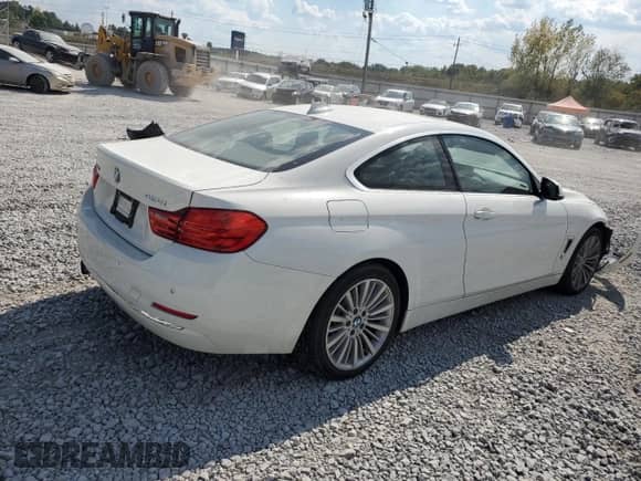 2014 BMW 4 Series 428i xDrive with VIN WBA3N9C57EF720911, listed as a Copart auction lot 80634825 with 145,150 mi miles and Salvage title. Bid and sale history available at DreamBid. Image 3.