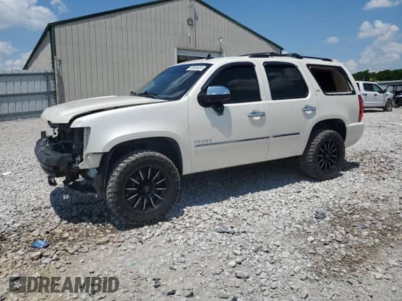 2011 Chevrolet Tahoe LTZ with VIN 1GNSKCE0XBR358774, listed as a Copart auction lot 60456535 with 231,594 mi miles and Salvage title. Bid and sale history available at DreamBid. Image 1.