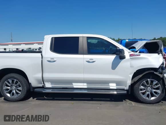 2021 Chevrolet Silverado 1500 RST z VIN 1GCUYEED6MZ158637, wystawiony jako IAAI lot #43168237 z przebiegiem 70 283 mil mil oraz . Historia ofert i sprzedaży dostępna na DreamBid. Obrazek 14.