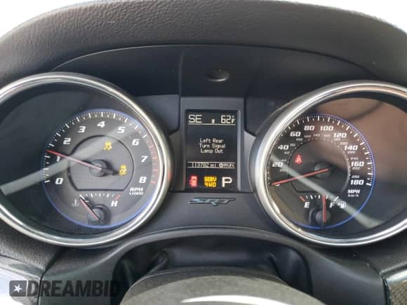 2012 Jeep Grand Cherokee SRT-8 z VIN 1C4RJFDJ7CC100156, wystawiony jako Copart lot #79865954 z przebiegiem 113 782 mil mil oraz Szkoda całkowita • Salvage title. Historia ofert i sprzedaży dostępna na DreamBid. Obrazek 9.