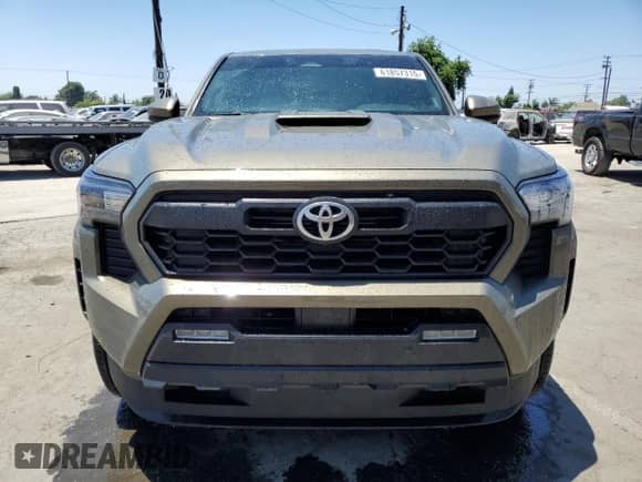 2024 Toyota Tacoma SR5 with VIN 3TMLB5FN1RM001210, listed as a Copart auction lot 61857315 with 26,388 mi miles and Salvage title. Bid and sale history available at DreamBid. Image 5.