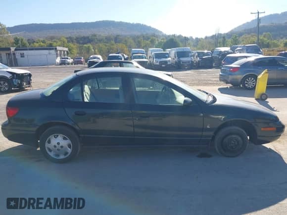 2000 Saturn SL with VIN 1G8ZG5286YZ236432, listed as a IAAI auction lot 43350377 with 146,104 mi miles and . Bid and sale history available at DreamBid. Image 13.