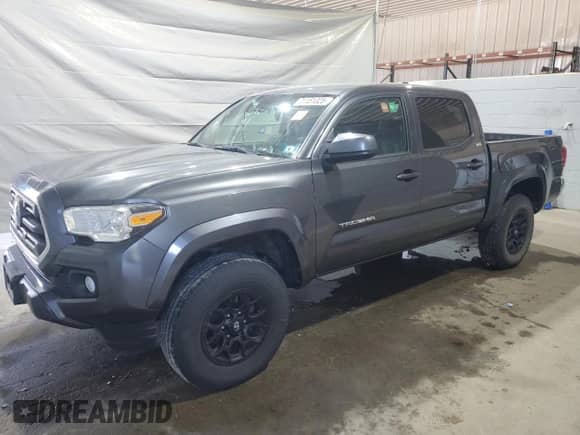 2019 Toyota Tacoma TRD Off Road z VIN 3TMCZ5AN9KM222854, wystawiony jako Copart lot #71151325 z przebiegiem 91 245 mil mil oraz Szkoda całkowita • Salvage title. Historia ofert i sprzedaży dostępna na DreamBid. Obrazek 1.