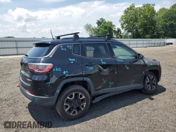 2017 Jeep Compass Trailhawk with VIN 3C4NJDDB6HT631761, listed as a Copart auction lot 62759555 with 94,528 mi miles and Salvage title. Bid and sale history available at DreamBid. Image 3.
