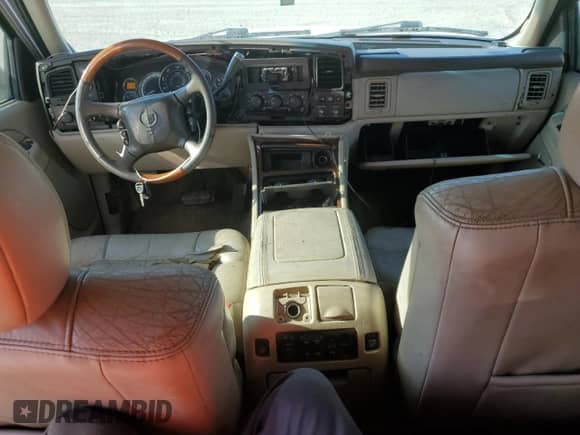 2002 Cadillac Escalade with VIN 1GYEC63T32R220635, listed as a Copart auction lot 70695125 with 191,657 mi miles and Salvage title. Bid and sale history available at DreamBid. Image 8.