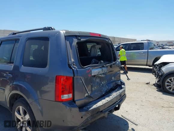 2014 Honda Pilot Touring with VIN 5FNYF3H98EB003274, listed as a IAAI auction lot 42815552 with 223,025 mi miles and . Bid and sale history available at DreamBid. Image 6.