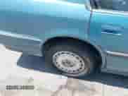 1991 Honda Accord EX z VIN JHMCB7560MC063583, wystawiony jako IAAI lot #42563870 z przebiegiem 226 798 mil mil oraz . Historia ofert i sprzedaży dostępna na DreamBid. Obrazek 18.