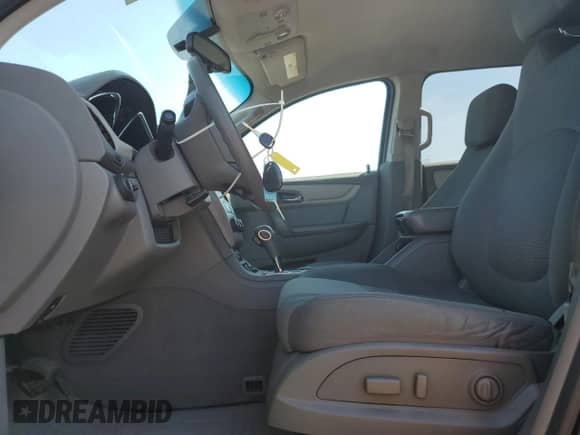 2017 Chevrolet Traverse LS с VIN 1GNKRFKD2HJ331001, выставлен на аукционе Copart как лот 80214535 с пробегом 152 122 миль миль и Чистый • Clean title. История ставок и продаж доступна на DreamBid. Изображение 7.