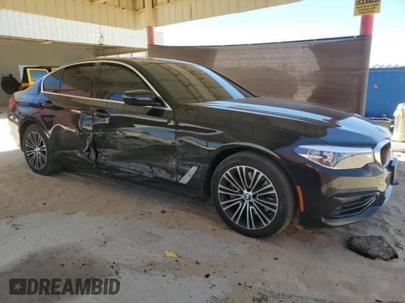 2020 BMW 5 Series 530e with VIN WBAJA9C01LCD69759, listed as a Copart auction lot 58271025 with 56,732 mi miles and Salvage title. Bid and sale history available at DreamBid. Image 4.
