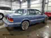 1991 Dodge Spirit with VIN 1B3XA46K9MF628235, listed as a Copart auction lot 83581274 with 117,774 mi miles and Salvage title. Bid and sale history available at DreamBid. Image 3.