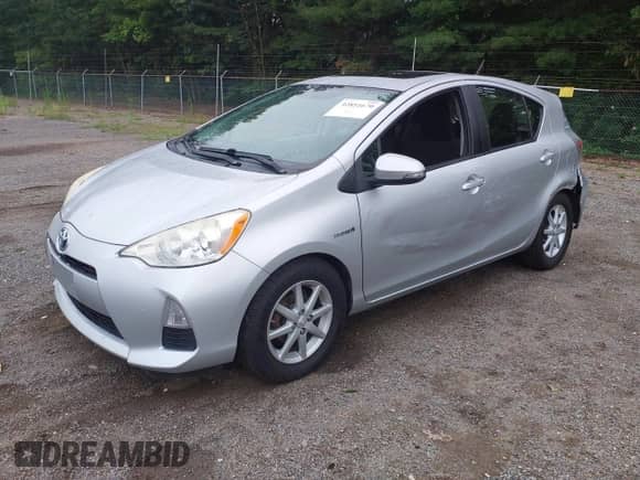 2013 Toyota Prius One z VIN JTDKDTB3XD1051060, wystawiony jako IAAI lot #42851670 z przebiegiem 163 017 mil mil oraz . Historia ofert i sprzedaży dostępna na DreamBid. Obrazek 21.