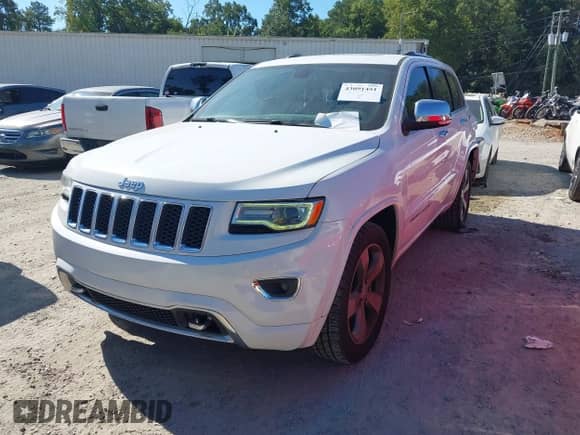 2016 Jeep Grand Cherokee High Altitude with VIN 1C4RJECG0GC335911, listed as a IAAI auction lot 43091451 with 150,848 mi miles and . Bid and sale history available at DreamBid. Image 17.