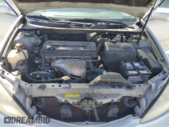 2004 Toyota Camry LE z VIN 4T1BE32K94U330420, wystawiony jako Copart lot #84407555 z przebiegiem 74 487 mil mil oraz Szkoda całkowita • Salvage title. Historia ofert i sprzedaży dostępna na DreamBid. Obrazek 11.