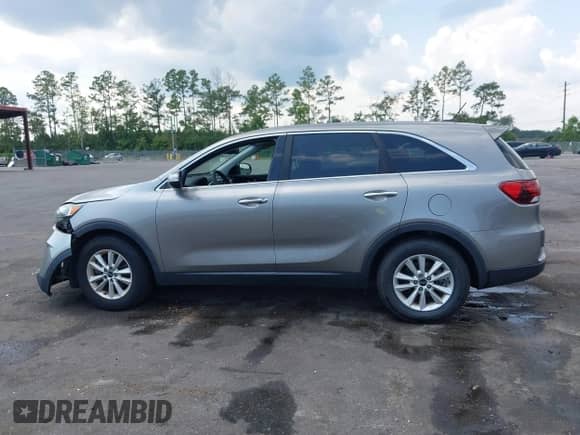 2019 Kia Sorento LX with VIN 5XYPG4A54KG512708, listed as a IAAI auction lot 43274077 with 53,859 mi miles and . Bid and sale history available at DreamBid. Image 14.