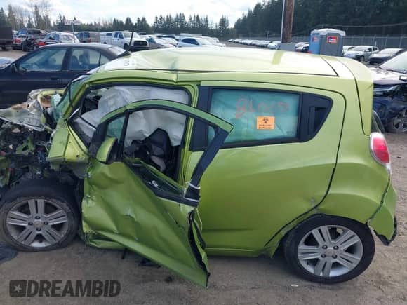 2013 Chevrolet Spark LT with VIN KL8CD6S93DC512722, listed as a IAAI auction lot 41879328 with Not provided miles and . Bid and sale history available at DreamBid. Image 14.