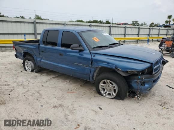 2002 Dodge Dakota Sport with VIN 1B7HL38N32S612860, listed as a Copart auction lot 70562135 with 227,963 mi miles and Non repairable. Bid and sale history available at DreamBid. Image 4.