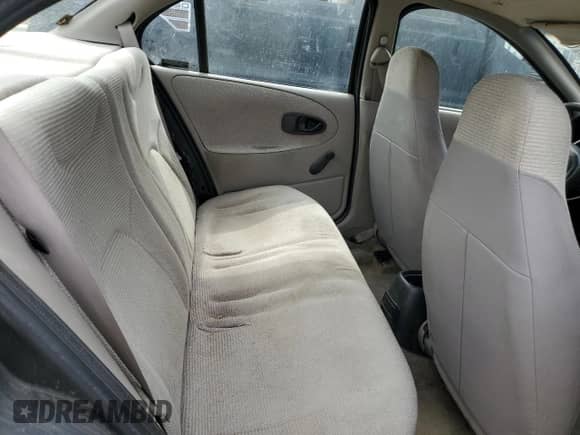 1999 Saturn SL z VIN 1G8ZF5281XZ122985, wystawiony jako Copart lot #67490155 z przebiegiem 139 416 mil mil oraz Szkoda całkowita • Salvage title. Historia ofert i sprzedaży dostępna na DreamBid. Obrazek 10.