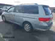 2008 Honda Odyssey EX-L with VIN 5FNRL38628B104477, listed as a IAAI auction lot 43363199 with 220,595 mi miles and . Bid and sale history available at DreamBid. Image 3.