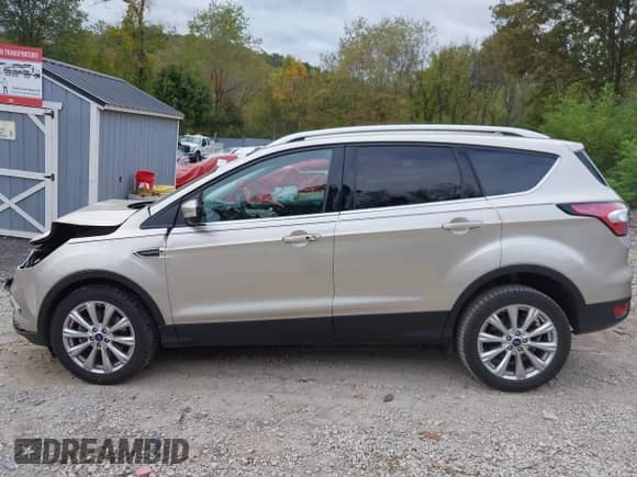 2017 Ford Escape Titanium with VIN 1FMCU9JD0HUC89677, listed as a IAAI auction lot 43418612 with 30,638 mi miles and . Bid and sale history available at DreamBid. Image 15.