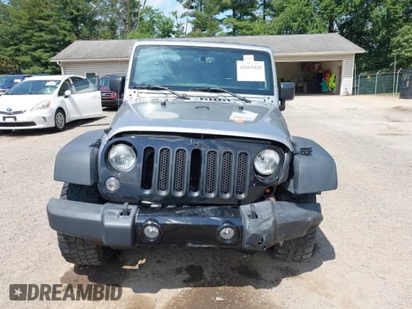 2015 Jeep Wrangler Sport with VIN 1C4AJWAG2FL507778, listed as a IAAI auction lot 42665428 with 126,554 mi miles and . Bid and sale history available at DreamBid. Image 13.
