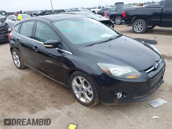2014 Ford Focus Titanium with VIN 1FADP3N2XEL451800, listed as a IAAI auction lot 43103609 with 215,961 mi miles and . Bid and sale history available at DreamBid. Image 1.