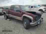 1998 Chevrolet Silverado 2500 с VIN 1GCGK29R0WE209238, выставлен на аукционе Copart как лот 65289165 с пробегом 141 791 миль миль и Списание • Salvage title. История ставок и продаж доступна на DreamBid. Изображение 4.