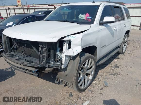 2015 Chevrolet Tahoe LS with VIN 1GNSCAKC4FR237468, listed as a IAAI auction lot 42032178 with 190,631 mi miles and . Bid and sale history available at DreamBid. Image 2.