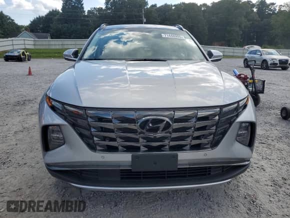 2022 Hyundai Tucson Limited with VIN 5NMJECAE9NH104687, listed as a Copart auction lot 71448905 with 33,059 mi miles and Salvage title. Bid and sale history available at DreamBid. Image 5.