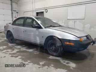 2001 Saturn SL with VIN 1G8ZJ54751Z324075, listed as a IAAI auction lot 43387665 with Not provided miles and . Bid and sale history available at DreamBid. Image 1.