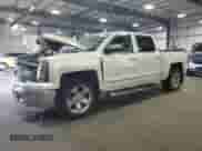 2015 Chevrolet Silverado 1500 LTZ with VIN 3GCUKSEC6FG127124, listed as a Copart auction lot 71790105 with 202,978 mi miles and Salvage title. Bid and sale history available at DreamBid. Image 1.