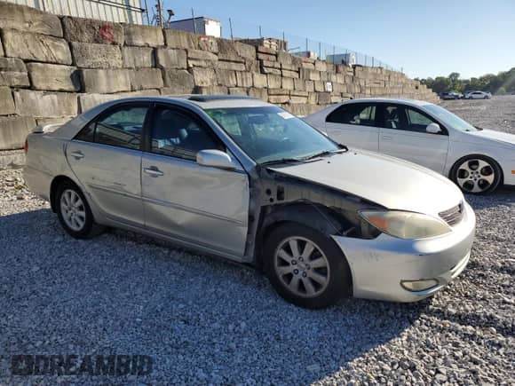 2003 Toyota Camry LE с VIN 4T1BF30K23U045444, выставлен на аукционе Copart как лот 69788145 с пробегом 204 433 миль миль и Списание • Salvage title. История ставок и продаж доступна на DreamBid. Изображение 4.