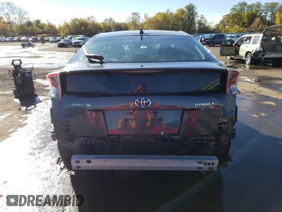 2018 Toyota Prius Two с VIN JTDKARFU7J3059521, выставлен на аукционе Copart как лот 86496545 с пробегом 61 868 миль миль и Списание • Salvage title. История ставок и продаж доступна на DreamBid. Изображение 6.