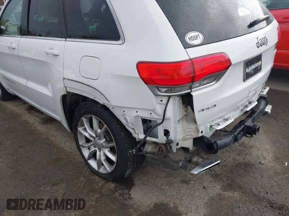 2015 Jeep Grand Cherokee Summit with VIN 1C4RJFJT3FC606755, listed as a IAAI auction lot 43426275 with 70,868 mi miles and . Bid and sale history available at DreamBid. Image 17.