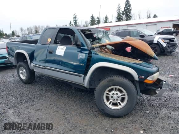 1997 Dodge Dakota z VIN 1B7GG23X9VS242604, wystawiony jako IAAI lot #41772203 z przebiegiem Nie podano mil oraz . Historia ofert i sprzedaży dostępna na DreamBid. Obrazek 1.