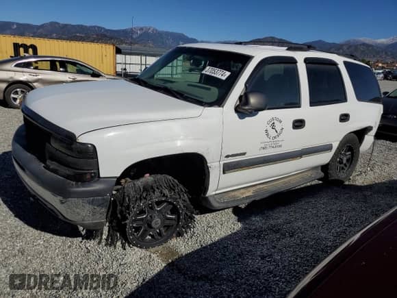 2003 Chevrolet Tahoe LS with VIN 1GNEK13V73J261578, listed as a Copart auction lot 37053774 with 208,162 mi miles and Salvage title. Bid and sale history available at DreamBid. Image 1.