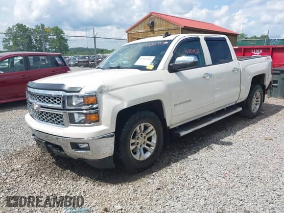 2015 Chevrolet Silverado 1500 LT with VIN 3GCUKREC4FG417564, listed as a IAAI auction lot 42511936 with 136,562 mi miles and . Bid and sale history available at DreamBid. Image 2.
