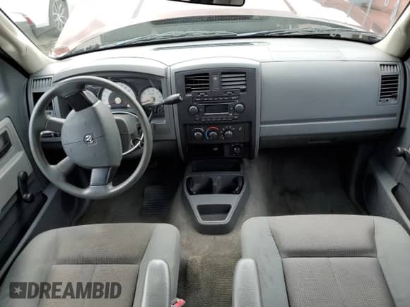 2005 Dodge Dakota ST с VIN 1D7HW28NX5S225511, выставлен на аукционе Copart как лот 64009084 с пробегом Не указан миль и Списание • Salvage title. История ставок и продаж доступна на DreamBid. Изображение 8.