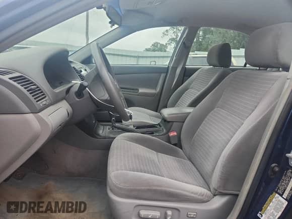 2005 Toyota Camry LE с VIN 4T1BE32K15U401465, выставлен на аукционе Copart как лот 84410985 с пробегом 124 241 миль миль и Списание • Salvage title. История ставок и продаж доступна на DreamBid. Изображение 7.