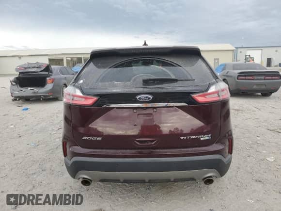 2019 Ford Edge Titanium with VIN 2FMPK4K9XKBB70858, listed as a Copart auction lot 85197985 with 88,408 mi miles and Salvage title. Bid and sale history available at DreamBid. Image 6.