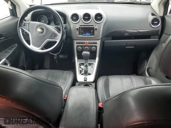 2014 Chevrolet Captiva Sport LTZ with VIN 3GNAL4EK5ES629435, listed as a Copart auction lot 82458595 with 119,160 mi miles and Salvage title. Bid and sale history available at DreamBid. Image 8.