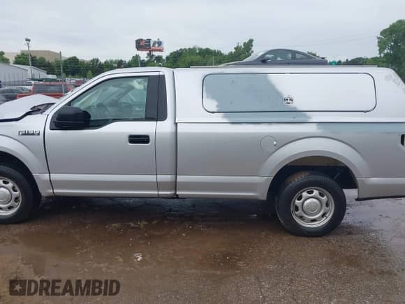 2019 Ford F-150 XL with VIN 1FTMF1C54KKD52096, listed as a IAAI auction lot 42130212 with 131,877 mi miles and . Bid and sale history available at DreamBid. Image 14.