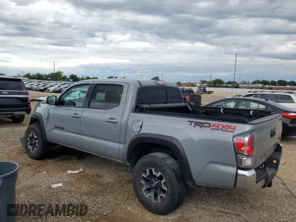 2021 Toyota Tacoma SR with VIN 3TMCZ5AN5MM418762, listed as a Copart auction lot 66169995 with 73,465 mi miles and Salvage title. Bid and sale history available at DreamBid. Image 2.