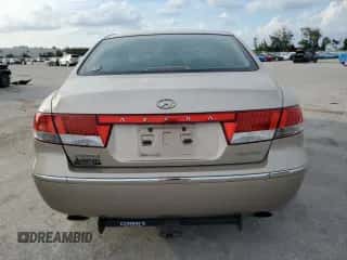 2006 Hyundai Azera SE с VIN KMHFC46F86A050504, выставлен на аукционе Copart как лот 78369604 с пробегом 292 360 миль миль и Списание • Salvage title. История ставок и продаж доступна на DreamBid. Изображение 6.