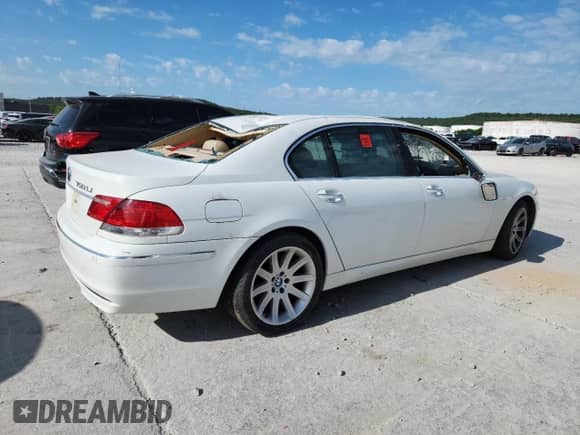 2006 BMW 7 Series 750Li с VIN WBAHN83516DT29945, выставлен на аукционе Copart как лот 66102545 с пробегом 145 402 миль миль и Списание • Salvage title. История ставок и продаж доступна на DreamBid. Изображение 3.