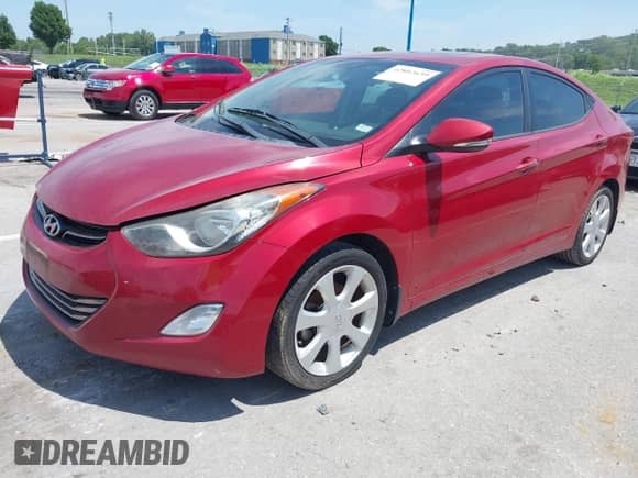 2013 Hyundai Elantra GLS with VIN KMHDH4AE7DU513820, listed as a IAAI auction lot 42802639 with 149,218 mi miles and . Bid and sale history available at DreamBid. Image 2.