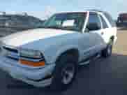 2002 Chevrolet Blazer LS с VIN 1GNCS18W72K174863, выставлен на аукционе IAAI как лот 43014539 с пробегом 208 577 миль миль и . История ставок и продаж доступна на DreamBid. Изображение 2.