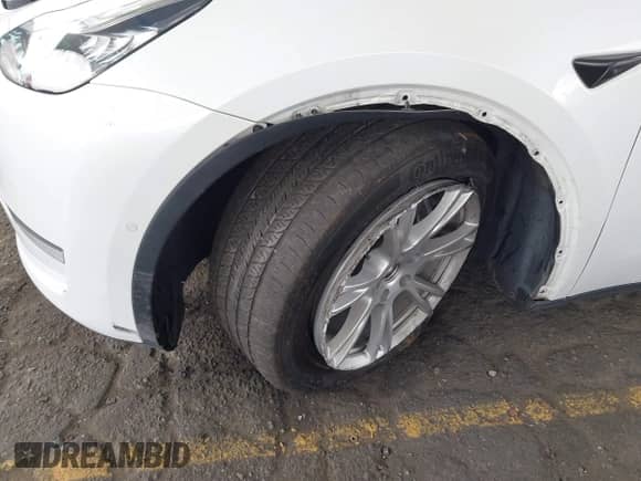 2022 Tesla Model Y Long Range z VIN 7SAYGDEE6NF345426, wystawiony jako IAAI lot #43121529 z przebiegiem 49 441 mil mil oraz . Historia ofert i sprzedaży dostępna na DreamBid. Obrazek 6.